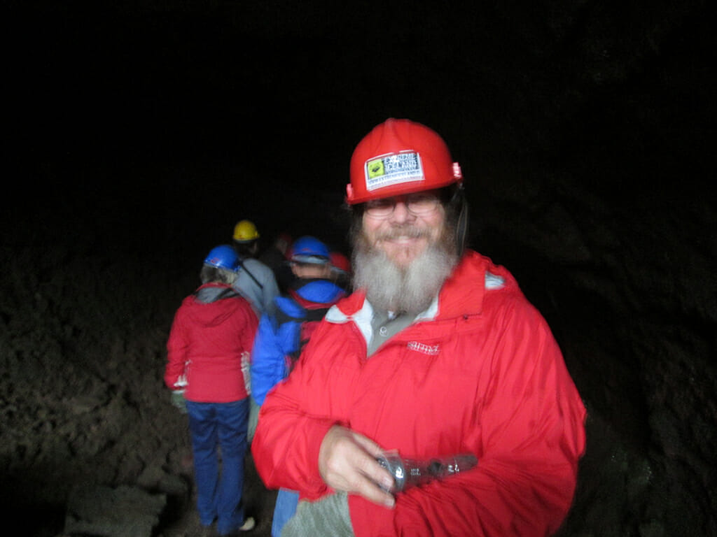 John in a lava tube Iceland
