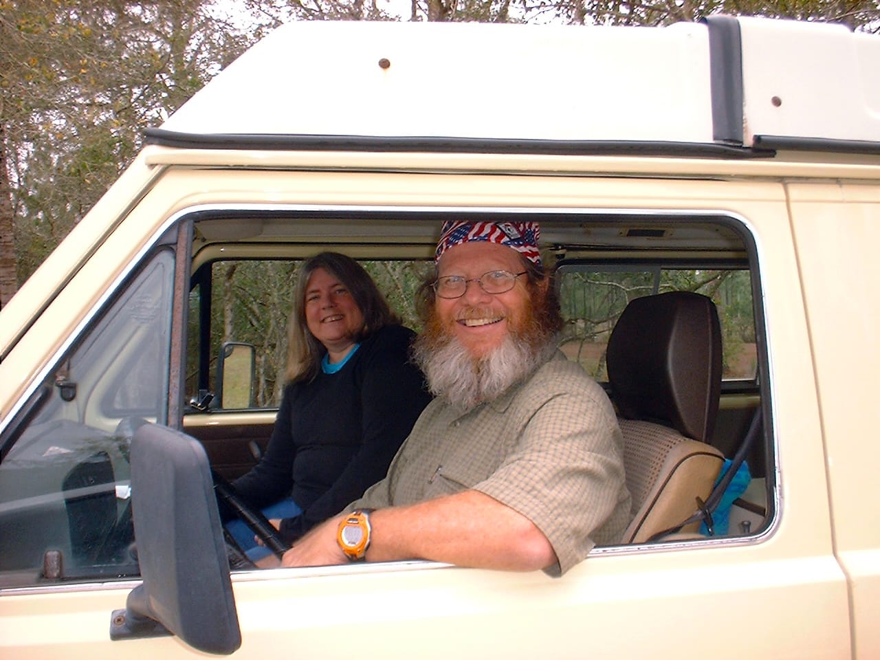 Woman and man inside a VW Westfalia